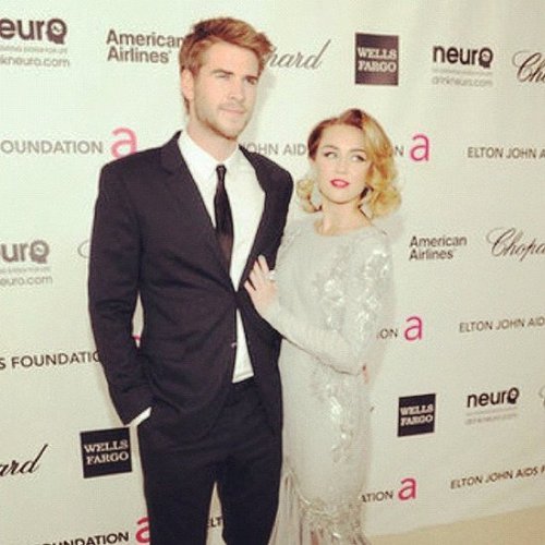 Miley Cyrus and Liam Hemsworth were one good-looking couple at Elton John's annual Oscar viewing party.
Miley Cyrus and Liam Hemsworth were one good-looking couple at Elton John's annual Oscar viewing party.
