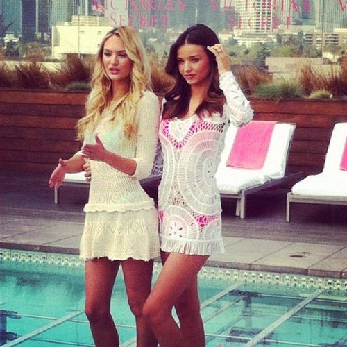 Miranda Kerr and Candice Swanepoel struck a pose by the pool in LA, despite the chilly weather, as they promoted the new Victoria's Secret collection.
Miranda Kerr and Candice Swanepoel struck a pose by the pool in LA, despite the chilly weather, as they promoted the new Victoria's Secret collection.