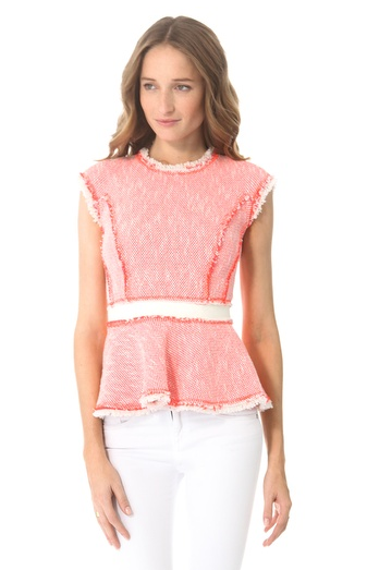Peplum is still a huge trend, so why not combine it with a lovely fabric like tweed via this Rebecca Taylor tweed peplum top ($350)? Wear it in the daytime with jeans or at night with leather pants.
Peplum is still a huge trend, so why not combine it with a lovely fabric like tweed via this Rebecca Taylor tweed peplum top ($350)? Wear it in the daytime with jeans or at night with leather pants.