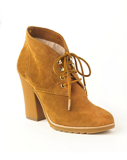 Embrace the cozy-chic cabin vibe when you pair these Michael Michael Kors Elliot Suede Lace-Up Ankle Boots ($140, originally $175) with easy denim and a plaid button-down.
Embrace the cozy-chic cabin vibe when you pair these Michael Michael Kors Elliot Suede Lace-Up Ankle Boots ($140, originally $175) with easy denim and a plaid button-down.