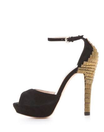 The gold detailing and sexy silhouette on these L.k. bennett Bellini Peep Toe Sandals ($382) also comes with a much more walkable platform so you don't have to sacrifice comfort for style.
The gold detailing and sexy silhouette on these L.k. bennett Bellini Peep Toe Sandals ($382) also comes with a much more walkable platform so you don't have to sacrifice comfort for style.