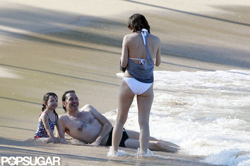 Bikini-Clad Milla Jovovich Poses Beachside With Her Family on NYE Bikini-Clad Milla Jovovich Poses Beachside With Her Family on NYE