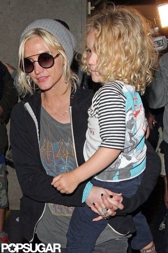 Ashlee Simpson carried Bronx Wentz as she made her way through the airport.
Ashlee Simpson carried Bronx Wentz as she made her way through the airport.