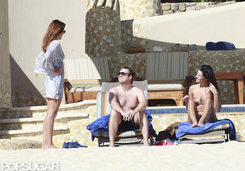 Cindy Crawford Covers Up For a Relaxing Beach Stroll Cindy Crawford Covers Up For a Relaxing Beach Stroll