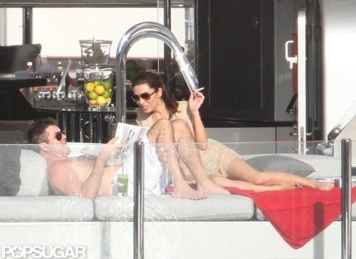 Simon Cowell and Mezhgan Hussainy lounged on a yacht.
Simon Cowell and Mezhgan Hussainy lounged on a yacht.