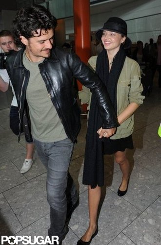 Orlando Bloom and his pregnant wife, Miranda Kerr, held hands leaving LAX in September 2010.
Orlando Bloom and his pregnant wife, Miranda Kerr, held hands leaving LAX in September 2010.