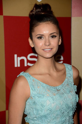 Nina Dobrev wore an updo to the soiree.
Nina Dobrev wore an updo to the soiree.