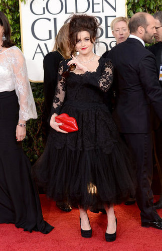 Mom of two Helena Bonham Carter got an early start on Valentine's Day with her lip-themed purse.
Mom of two Helena Bonham Carter got an early start on Valentine's Day with her lip-themed purse.