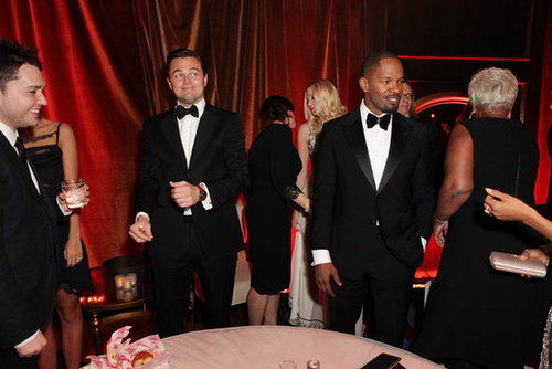 Leonardo DiCaprio and Jamie Foxx mingled with other guests at the Weinstein afterparty.
Leonardo DiCaprio and Jamie Foxx mingled with other guests at the Weinstein afterparty.