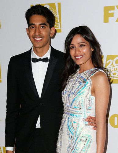 Dev Patel and Freida Pinto smiled for cameras at the Fox Searchlight after party.
Dev Patel and Freida Pinto smiled for cameras at the Fox Searchlight after party.