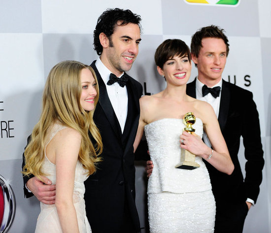 Amanda Seyfried, Sacha Baron Cohen, Eddie Redmaybe, and Anne Hathaway got together for a photo.
Amanda Seyfried, Sacha Baron Cohen, Eddie Redmaybe, and Anne Hathaway got together for a photo.