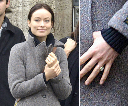 Olivia Wilde and Jason Sudeikis got engaged over the holidays in late 2012. Olivia showed off her antique ring while filming in Rome in January.
Olivia Wilde and Jason Sudeikis got engaged over the holidays in late 2012. Olivia showed off her antique ring while filming in Rome in January.