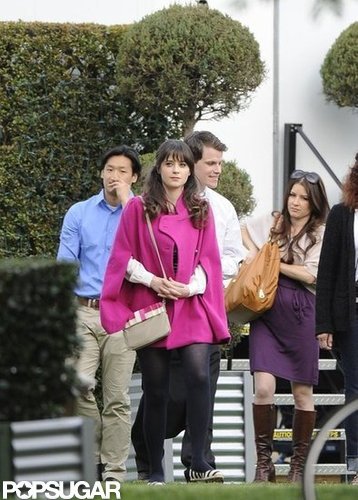 Zooey Deschanel Gets Sporty in Stripes on the Set of New Girl Zooey Deschanel Gets Sporty in Stripes on the Set of New Girl