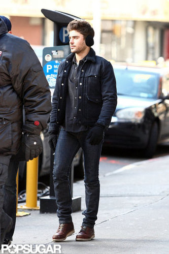 Zac Efron filmed while wearing earmuffs in NYC.
Zac Efron filmed while wearing earmuffs in NYC.
