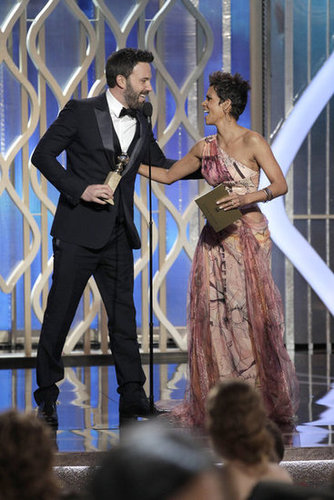 Ben Affleck accepted his Golden Globe from Halle Berry.
Ben Affleck accepted his Golden Globe from Halle Berry.