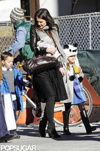 Katie Holmes Takes On Chilly NYC With Suri — and Suri's Panda Hat Katie Holmes Takes On Chilly NYC With Suri — and Suri's Panda Hat
