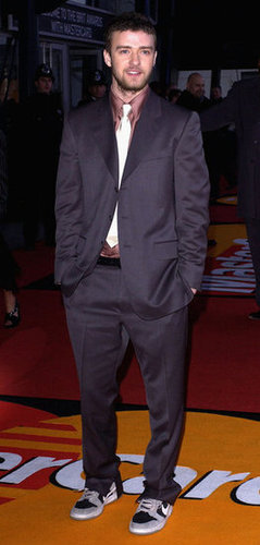 Justin paired his slouchy suit and tie with Nike sneakers at the Brit Awards back in 2004.
Justin paired his slouchy suit and tie with Nike sneakers at the Brit Awards back in 2004.