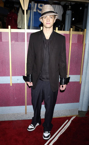 Justin accessorized his suit and tie with a wool fedora and cool kicks at the VMAs in 2002.
Justin accessorized his suit and tie with a wool fedora and cool kicks at the VMAs in 2002.