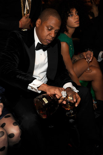 Jay-Z helped himself to a drink in the audience.
Jay-Z helped himself to a drink in the audience.