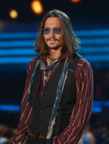 Johnny Depp sported shades during the Grammy Awards.
Johnny Depp sported shades during the Grammy Awards.