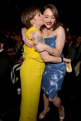 Lena Dunham planted a kiss on Kat Dennings at the Grammy Awards in LA on Sunday.
Lena Dunham planted a kiss on Kat Dennings at the Grammy Awards in LA on Sunday.
