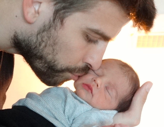 Gerard Piqué kissed his new son, Milan. Gerard Piqué kissed his new son, Milan.