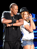 Beyoncé and Jay Z shared back-to-back smiles while performing together at Coachella Valley Music and Arts Festival in April 2010.