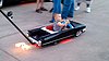 Incredible "Cadillac" Baby Stroller Shoots Flames (VIDEO)