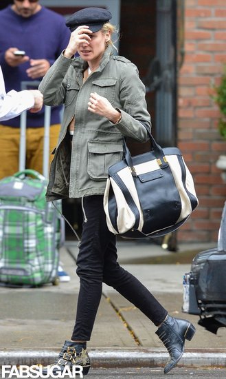 Diane Kruger showed off her signature street style in NYC: a green anorak, black fisherman's cap, a black-and-white Chloé bag, and studded Chloé booties.
Diane Kruger showed off her signature street style in NYC: a green anorak, black fisherman's cap, a black-and-white Chloé bag, and studded Chloé booties.