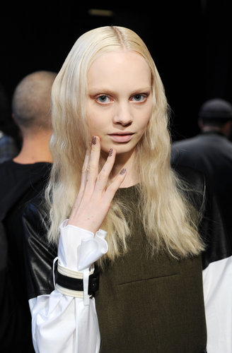 Since the collection was so graphic, Gilbert wanted to go in the opposite direction. Instead, she opted for cool-girl hair.
Since the collection was so graphic, Gilbert wanted to go in the opposite direction. Instead, she opted for cool-girl hair.