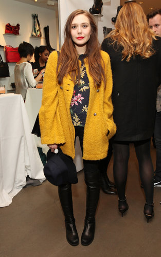 Elizabeth Olsen brightened her all-black bottoms with a floral blouse and nubby yellow coat while perusing the Cher Coulter capsule collection for AG Jeans.
Elizabeth Olsen brightened her all-black bottoms with a floral blouse and nubby yellow coat while perusing the Cher Coulter capsule collection for AG Jeans.