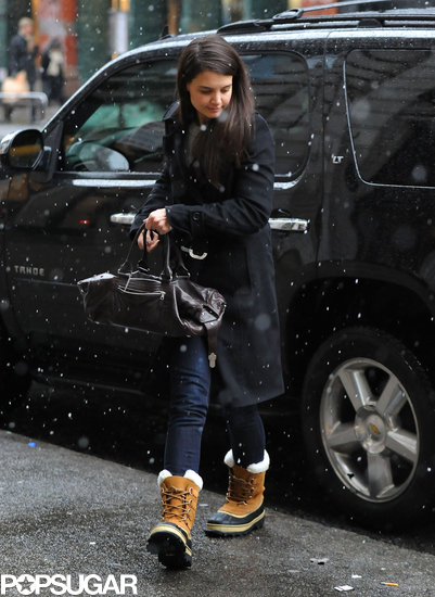 Katie Holmes tried to keep warm in NYC during the snowstorm Friday. Katie Holmes tried to keep warm in NYC during the snowstorm Friday.