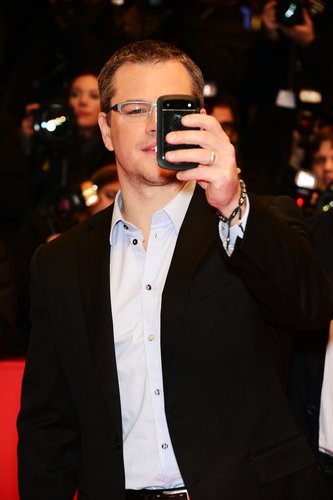 Matt Damon joked around on the red carpet taking pictures of the fans and photographers Friday night in Berlin.
Matt Damon joked around on the red carpet taking pictures of the fans and photographers Friday night in Berlin.