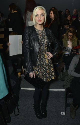 Ashlee Simpson topped her printed dress with a black leather biker jacket, then completed her front-row look with a gray beanie at Nicole Miller.
Ashlee Simpson topped her printed dress with a black leather biker jacket, then completed her front-row look with a gray beanie at Nicole Miller.
