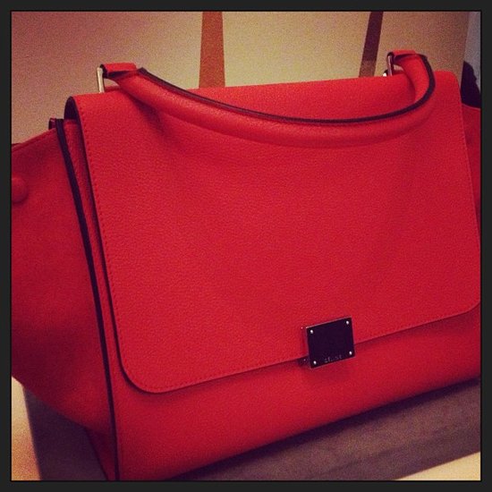 How stunning is the shade of orange on this Céline trapeze bag?
How stunning is the shade of orange on this Céline trapeze bag?