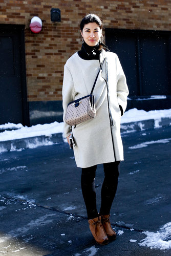 Caroline Issa opted for sensible footwear — then dressed up the look with a Jason Wu handbag.
Caroline Issa opted for sensible footwear — then dressed up the look with a Jason Wu handbag.