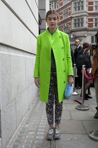 A lime-green coat gave trousers and cross-trainers a bold contrast.
A lime-green coat gave trousers and cross-trainers a bold contrast.