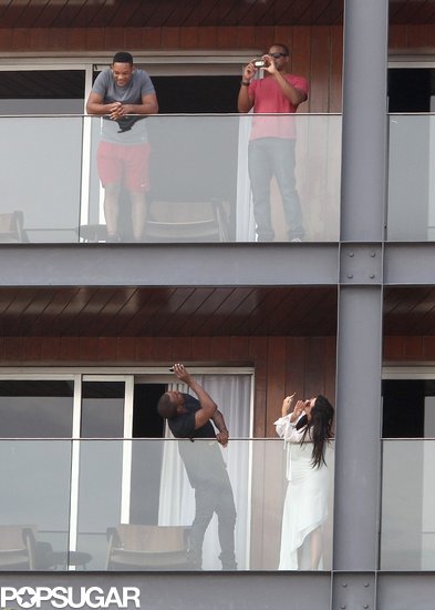 Kanye West and Kim Kardashian took photos of Will Smith on the balcony of his hotel room, which was located directly above the couple's room.
Kanye West and Kim Kardashian took photos of Will Smith on the balcony of his hotel room, which was located directly above the couple's room.