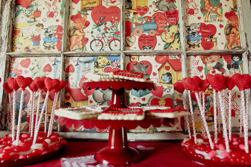 The sweets station had guests seeing red: candies, cookies, and vintage Valentine's Day posters.
Source: Jenny Cookies
The sweets station had guests seeing red: candies, cookies, and vintage Valentine's Day posters.
Source: Jenny Cookies