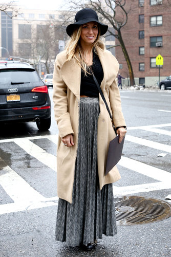 A floppy hat meets a pleated skirt for the full bohemian effect.
A floppy hat meets a pleated skirt for the full bohemian effect.