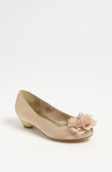 A gold pump ($56) with a kitten heel is fancy but comfortable to keep her going even through the afterparties.
A gold pump ($56) with a kitten heel is fancy but comfortable to keep her going even through the afterparties.