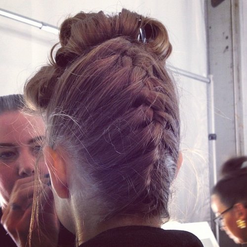 At Badgley Mischka, braided updos were inspired by Hitchcockian beauties.
At Badgley Mischka, braided updos were inspired by Hitchcockian beauties.