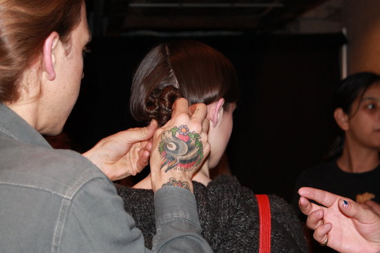 "I was inspired by an image of Twiggy," James Pecis, lead stylist for Bumble and Bumble, said. "It's an iconic image where she has a side part and the back is slicked. But I wanted to add some character to the back."
"I was inspired by an image of Twiggy," James Pecis, lead stylist for Bumble and Bumble, said. "It's an iconic image where she has a side part and the back is slicked. But I wanted to add some character to the back."