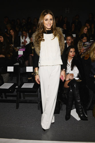 Olivia Palermo tossed a fur vest over her colorblock sweater and wide-leg white trousers at Rachel Zoe.
Olivia Palermo tossed a fur vest over her colorblock sweater and wide-leg white trousers at Rachel Zoe.