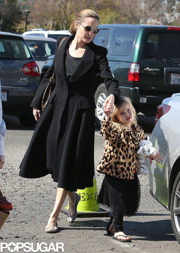 Angelina Jolie held Vivienne's hand.
Angelina Jolie held Vivienne's hand.