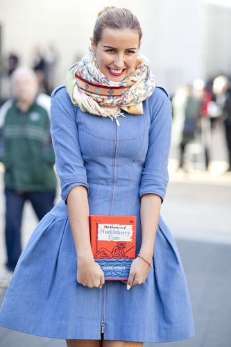 We love the sweet shape of her dress, not to mention her adorable literary clutch.
We love the sweet shape of her dress, not to mention her adorable literary clutch.