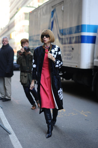 Anna Wintour dressed a pretty sheath and statement coat with knee-high boots.
Anna Wintour dressed a pretty sheath and statement coat with knee-high boots.
