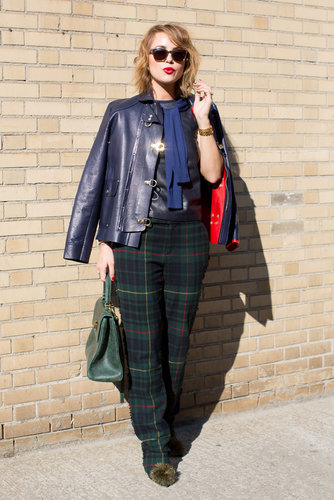 Kelly Framel was the picture of prep-meets-punk in plaid trousers and a navy leather jacket.
Kelly Framel was the picture of prep-meets-punk in plaid trousers and a navy leather jacket.