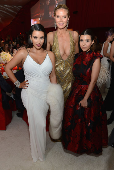 Heidi Klum posed with a pregnant Kim Kardashian and Kourtney Kardashian at Elton John's party.
Heidi Klum posed with a pregnant Kim Kardashian and Kourtney Kardashian at Elton John's party.