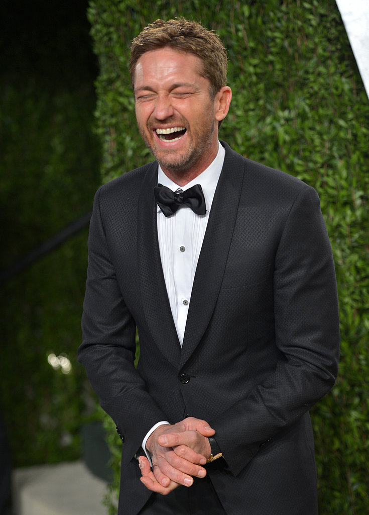 Gerard Butler laughed as he arrived at the Vanity Fair Oscar party on Sunday night.
Gerard Butler laughed as he arrived at the Vanity Fair Oscar party on Sunday night.